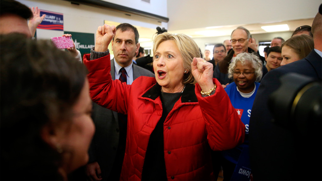 Democratic presidential candidate Hillary Clinton meets with staff at the Hillary for Iowa Office in Des Moines, Iowa, Monday, Feb. 1, 2016. (AP Photo/Andrew Harnik)