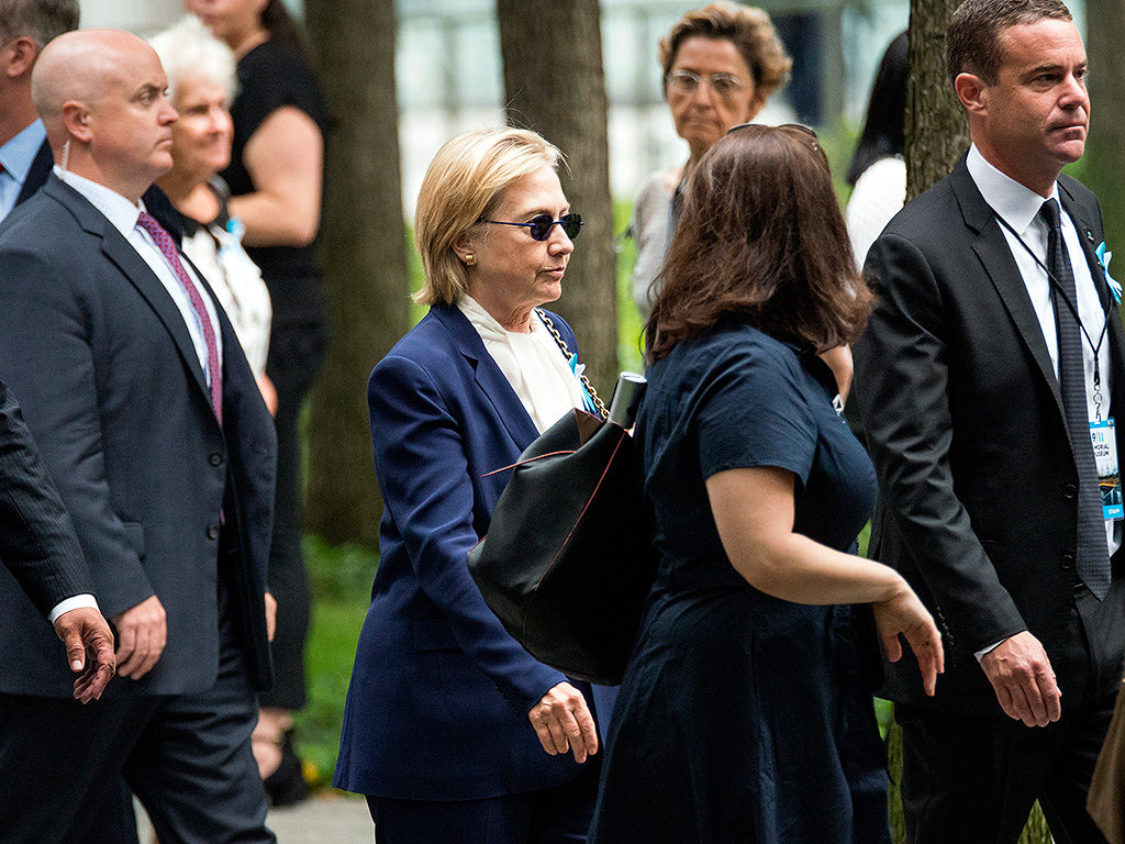 Democratic Presidential nominee Hillary Clinton is seen arriving at a ceremony at Ground Zero held in commemoration of the 15th anniversary of the terrorist attacks on the World Trade Center, the Pentagon and the crash of United Airlines Flight 93 in Shanksville, PA, in lower Manhattan, New York City, NY, USA on September 11, 2016. (Photo by Albin Lohr-Jones) *** Please Use Credit from Credit Field ***